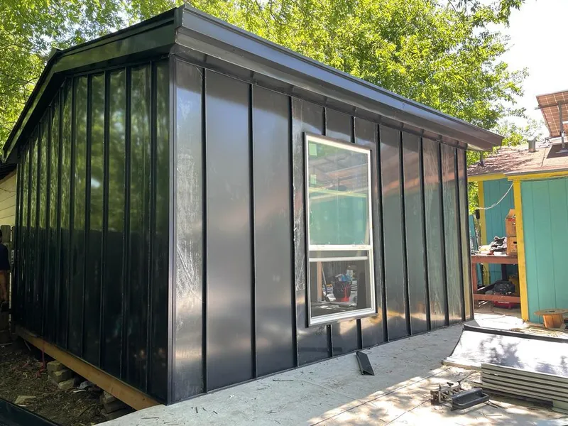 Black standing seam metal wall panels for Metal Roof Installation in Ponchatoula