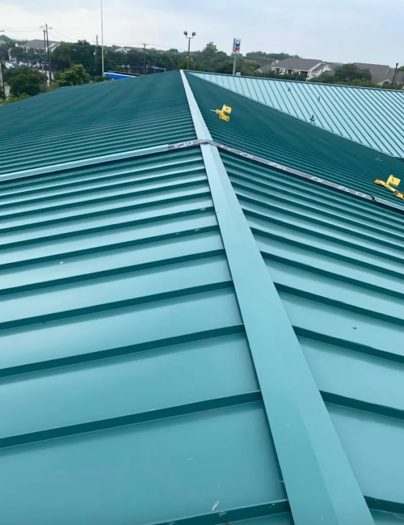 Green commercial metal roof ridge and valley for Metal Roof Repair in Ponchatoula